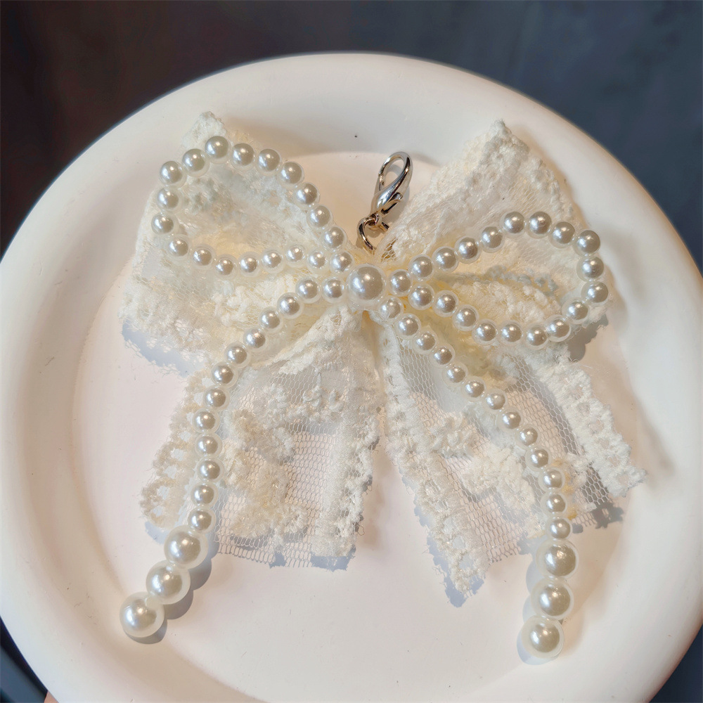 แฟชั่นลูกไม้มุกโบว์เชือกผูกรองเท้าหัวเข็มขัดรองเท้าผ้าใบตกแต่ง Charm รองเท้าดอกไม้หัวเข็มขัดผู้ชายและผู้หญิงรองเท้า Charm อุปกรณ์เสริม