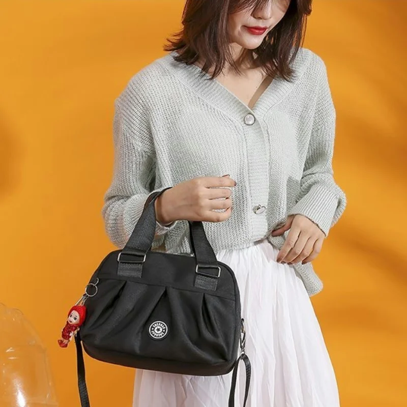 ใหม่ผู้หญิงกระเป๋าไนลอนกันน้ํากระเป๋าMessengerสําหรับสุภาพสตรีCrossbodyไหล่กระเป๋าถือลําลองคุณภาพสูงMultifunction
