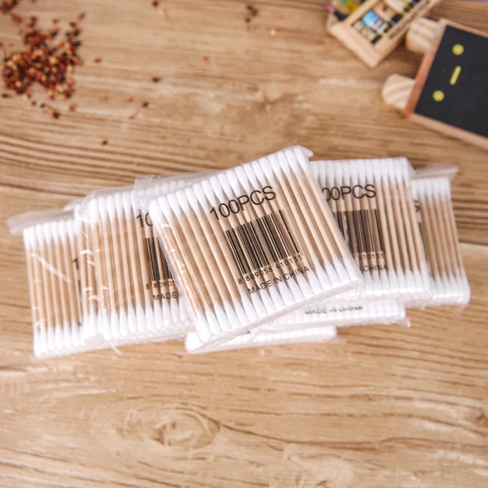Tamponi di cotone a doppia punta da 100 pezzi Texture confortevole Bastone di legno Materiale di prima classe in bambù ecologico