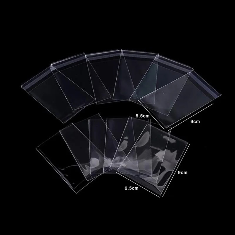 1 แพ็ค (100 ชิ้น) 65*90 มม.การ์ดการ์ด Protector Magic Killers ของสาม Kingdom ฟุตบอล Star การ์ดโปร่งใสเกมกระดาน