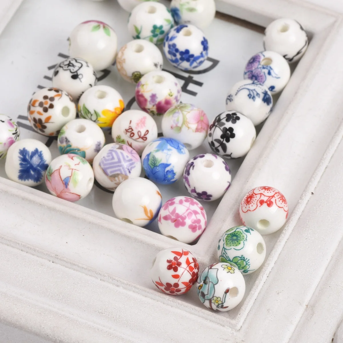 10 個 10 ミリメートル 12 ミリメートル花柄ラウンドセラミック磁器ルーススペーサービーズ DIY 工芸品ブレスレットジュエリーメイキング 1 # ~44 #