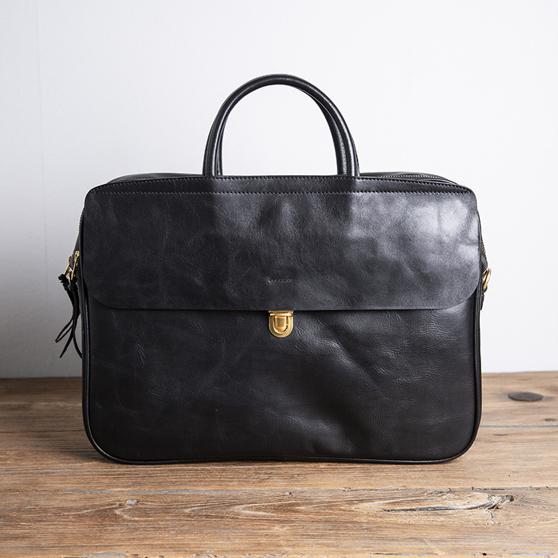 Bolso con ruedas plegable de marca de lujo para hombre, maletín Retro de cuero de 15 pulgadas, bolso de ordenador de negocios con cabeza de piel de vaca, 2024