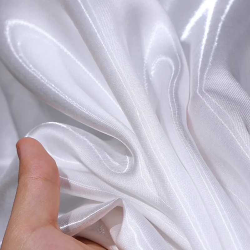 Kleidung Stoff Kristall Seide Satin Polyester Material Flash knusprige Stoff Kleid Wind jacke Mantel Bühne Design Stoff pro Meter