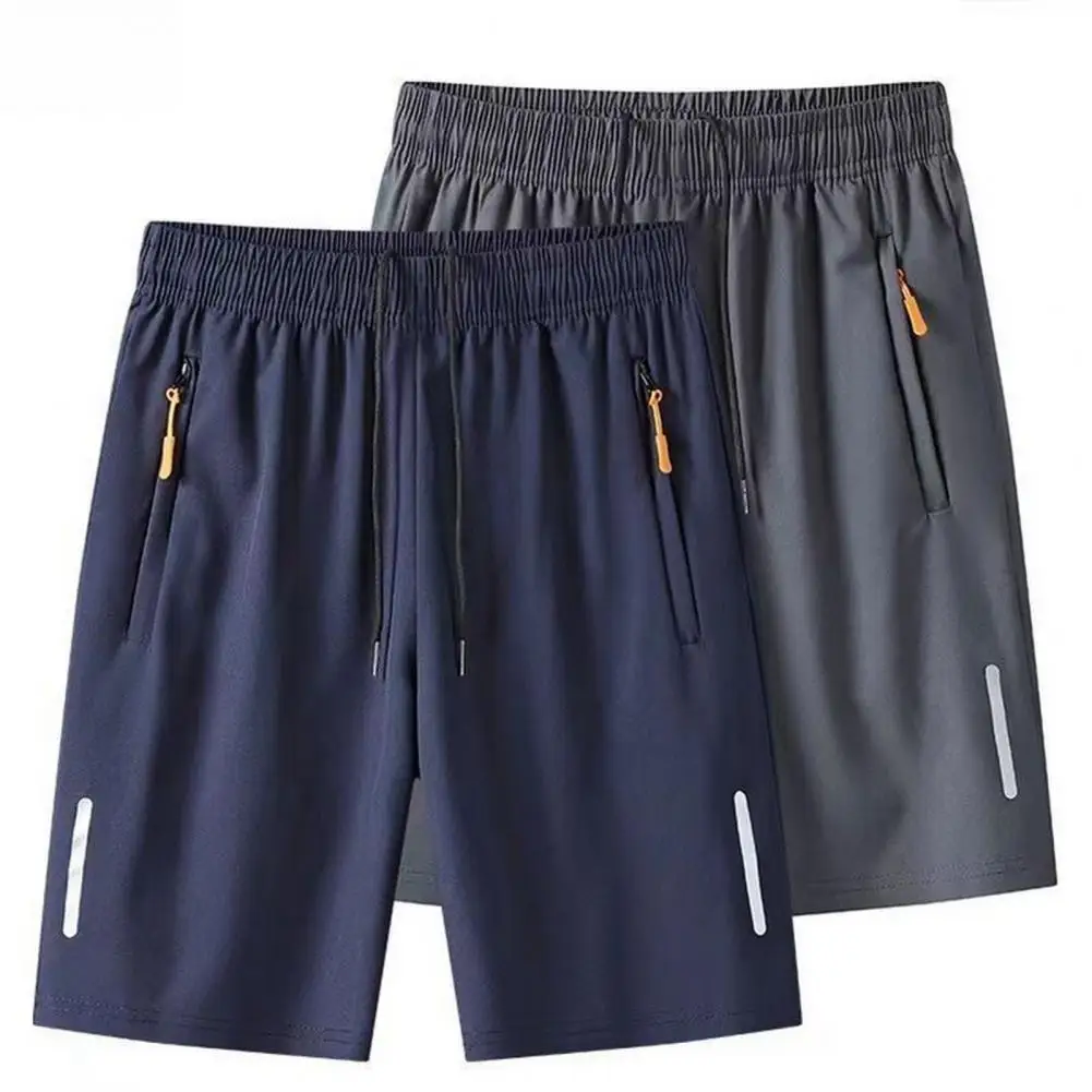 Pantalones cortos de talla grande de verano para hombre, pantalones cortos frescos de seda helada, pantalones cortos finos sueltos de secado rápido a la moda para hombre, pantalones de chándal deportivos informales elásticos