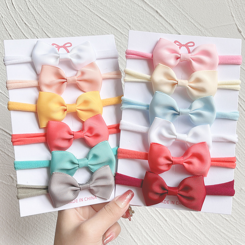 6 ชิ้น/เซ็ตสีทึบ Grograin ริบบิ้น Bowknot สําหรับสาวใหม่ Headwear ผมวงยืดหยุ่นผมเด็กทารกอุปกรณ์เสริมผม