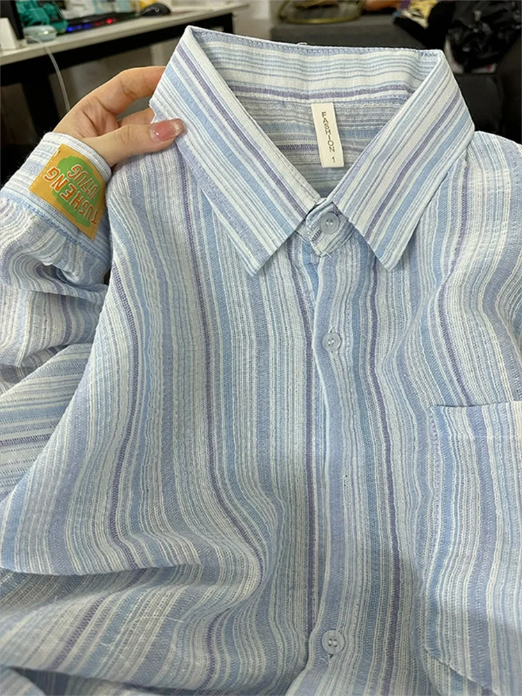 レトロストライプ長袖シャツ女性の春秋薄いデザインルーズ日焼け防止ブルーシャツコートボタンアップレギュラー丈