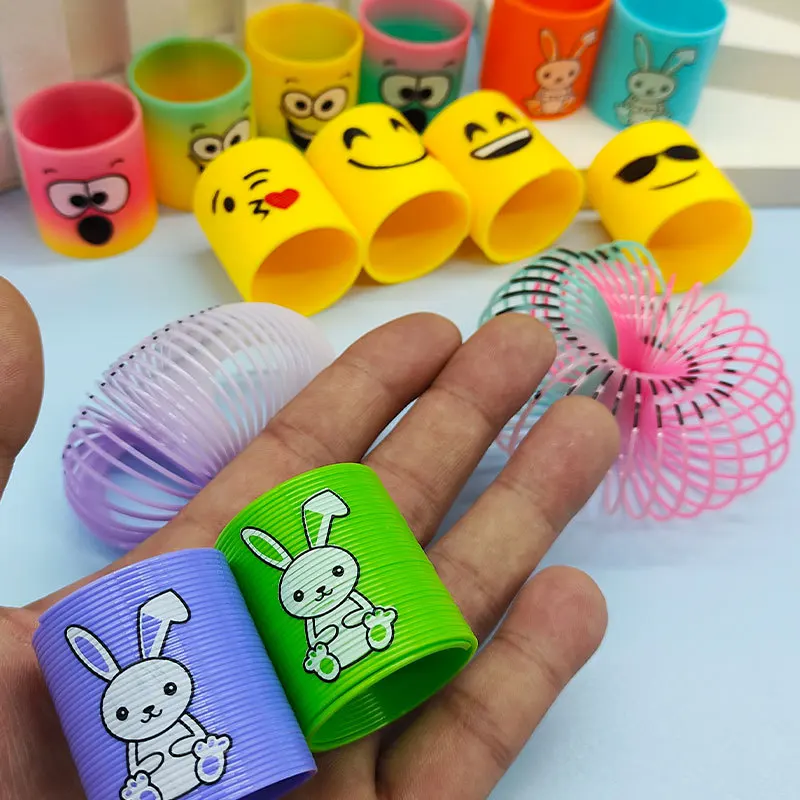 12 stücke Regenbogen Kreis Lustige Magie Spielzeug Kinder Pädagogisches Spule Bunte Kreis Teleskop Elastische Magie Ring Kinder Lustige Geschenke