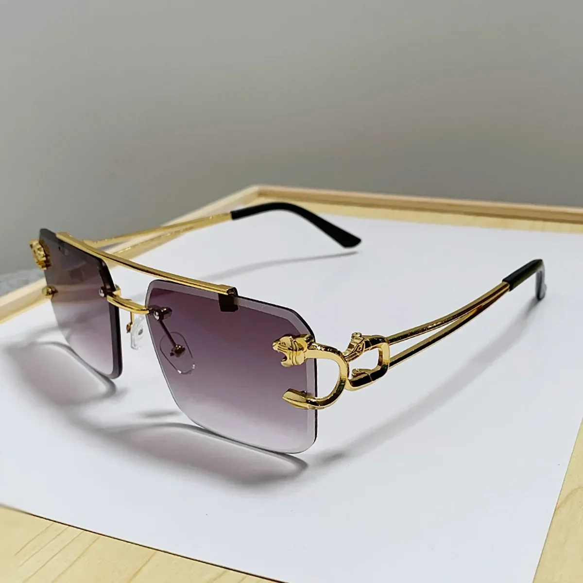 กรอบทองแฟชั่นแว่นตากันแดดโลหะเสือดาว Rimless แว่นตากันแดด Double Bridges Gradient Ocean ฟิล์ม Shades UV400