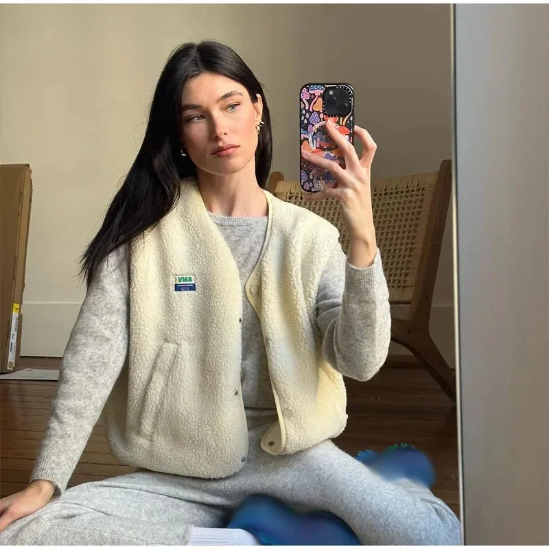 Elegante colete de bolso único para mulher 2025 outono europeu e americano estilo transfronteiriço lanoso sem mangas topo