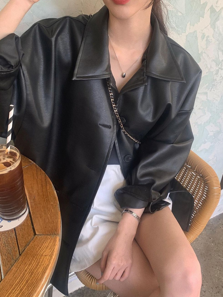 エレガントなミッドレングスブラックレザージャケット女性のファッショナブルな多用途 Pu レザーコート秋冬スタイリッシュなトップ女性のための
