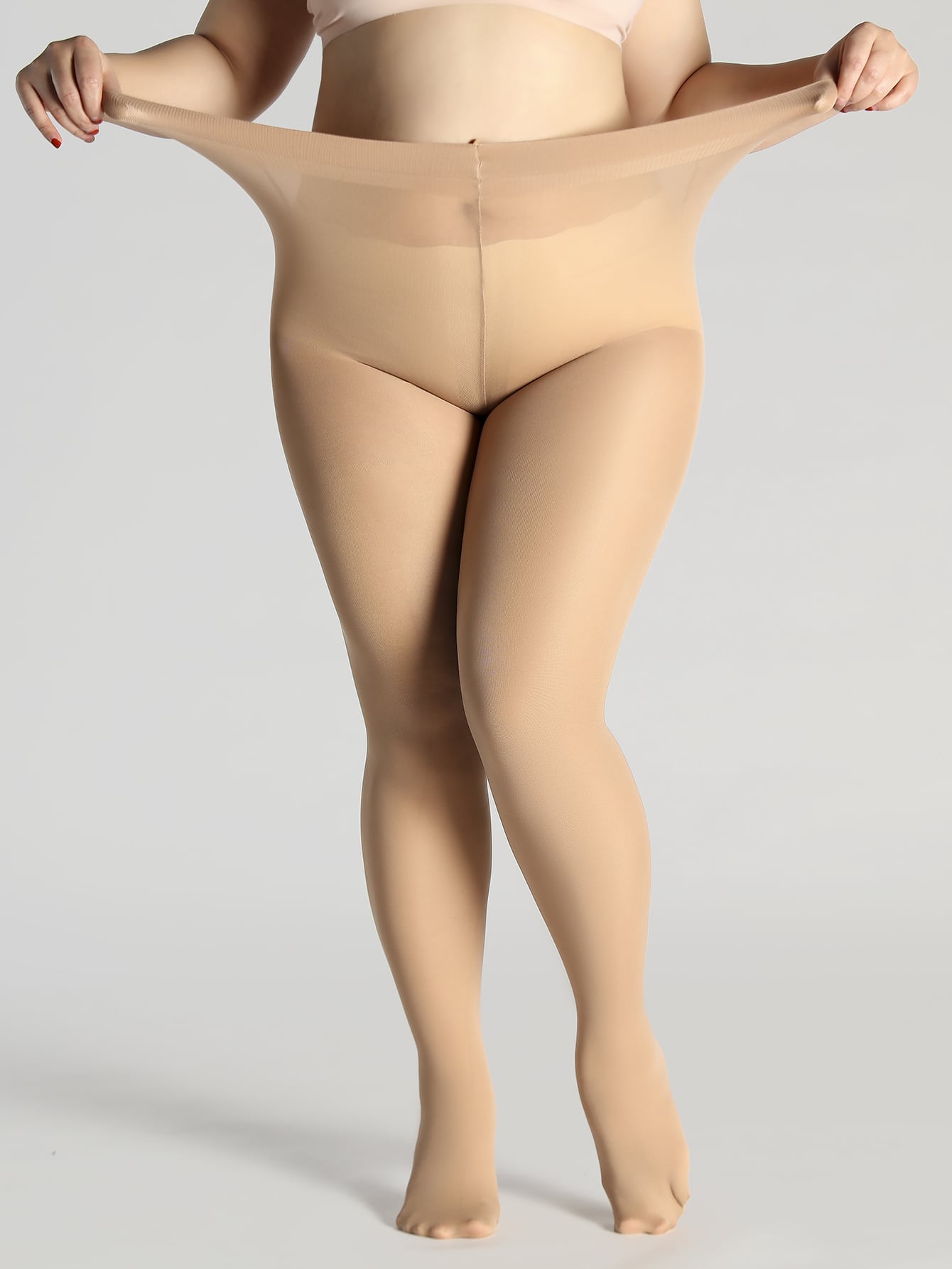 Um par de meias pretas femininas plus size moda plus size meia-calça