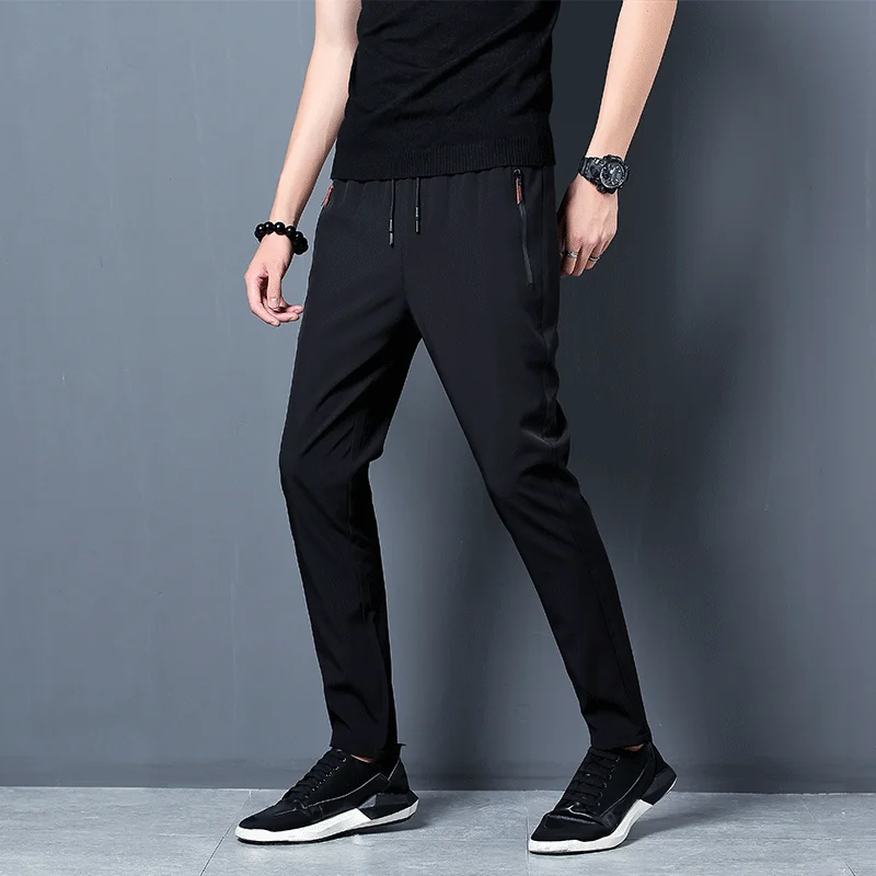 Pantalones informales para hombre, pantalones elásticos ajustados con cintura elástica, pantalones clásicos coreanos azules, negros y grises de marca para hombre de talla grande
