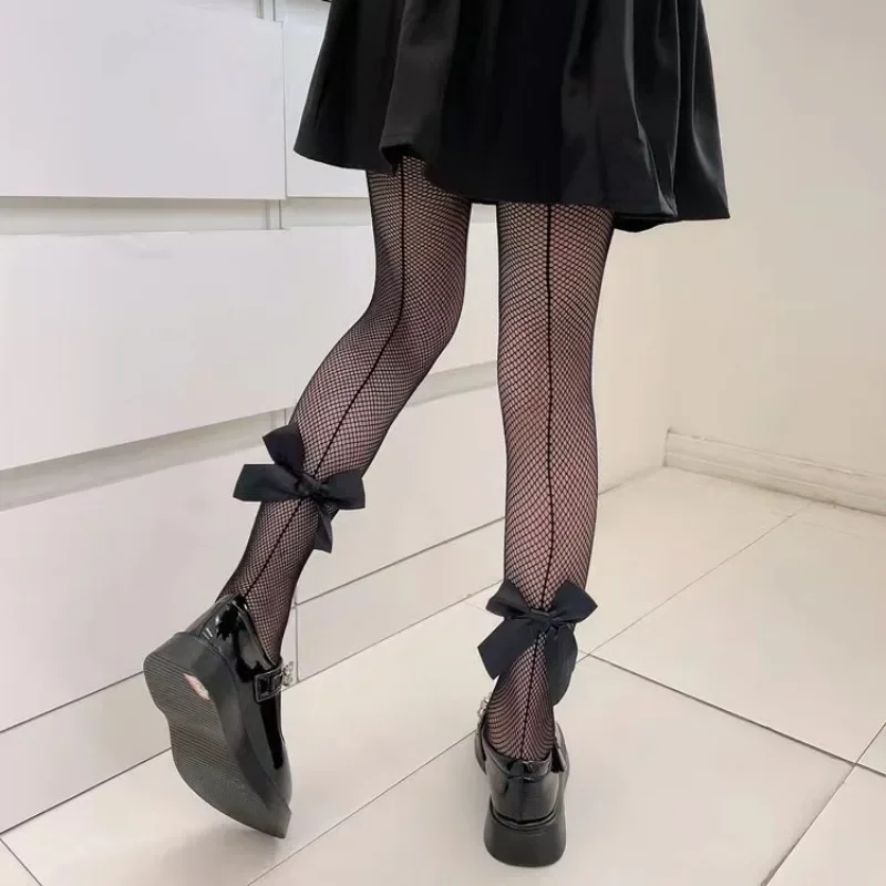 Medias de red de pesca para niñas, pantimedias bonitas de lazo grande de Lolita, medias sexis de nailon de malla hueca negra, mallas para niños