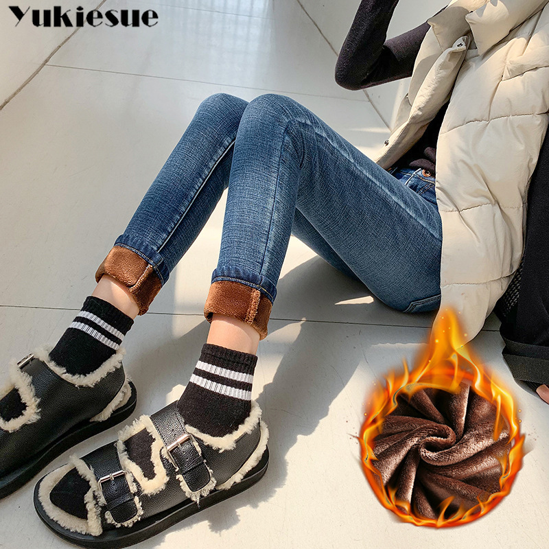 Pantalones vaqueros ajustados de cintura alta de terciopelo grueso para mujer de invierno pantalones pitillo de mezclilla informales elásticos ajustados cálidos de lana simples para mujer