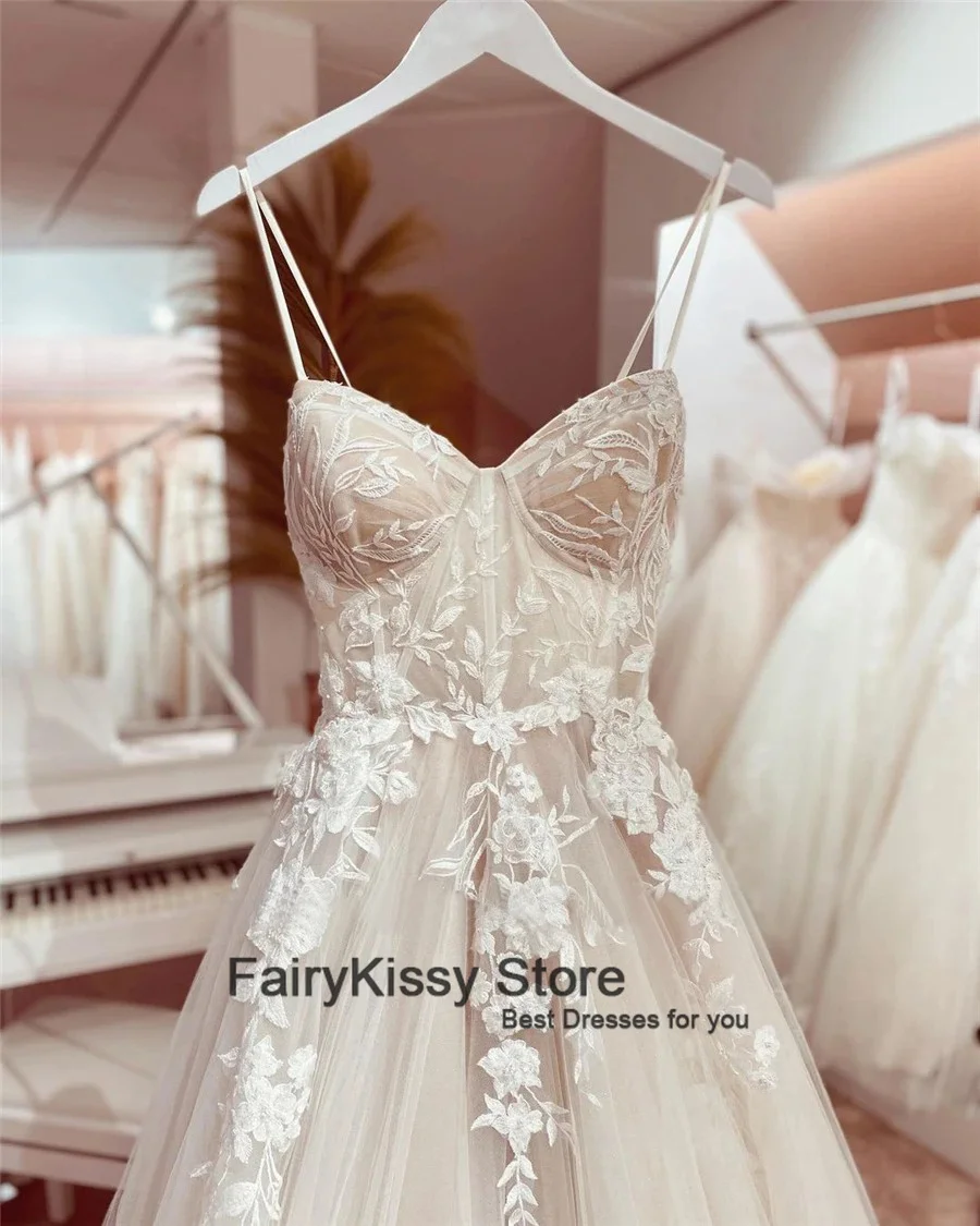 FairyKissy สปาเก็ตตี้เซ็กซี่สายรัดตาข่ายเปลือยดูผ่านสัมผัส Boning ชุดแต่งงาน Backless เจ้าหญิงลูกไม้ชุดเจ้าสาว