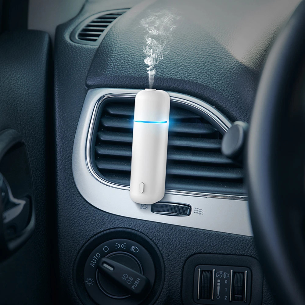 รถ Aroma Diffuser Mini USB ชาร์จกลิ่นเครื่องน้ํามันหอมระเหย Car Air Freshener Essential Oil Diffuser Vent คลิป