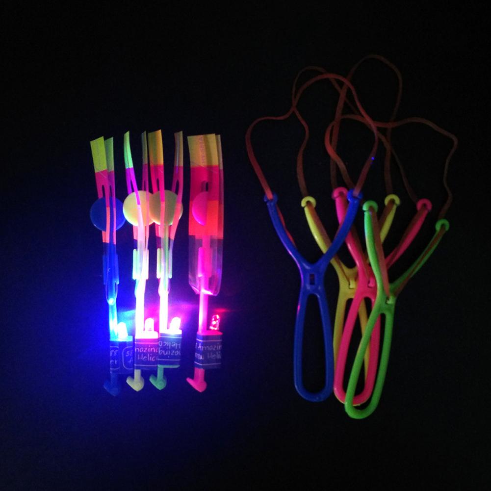 10Pcs Funny Luminous Slingshot Flying Arrow LED Light Up Flashing Dragonfly Glow For Kids Party Toys Gift Color Random