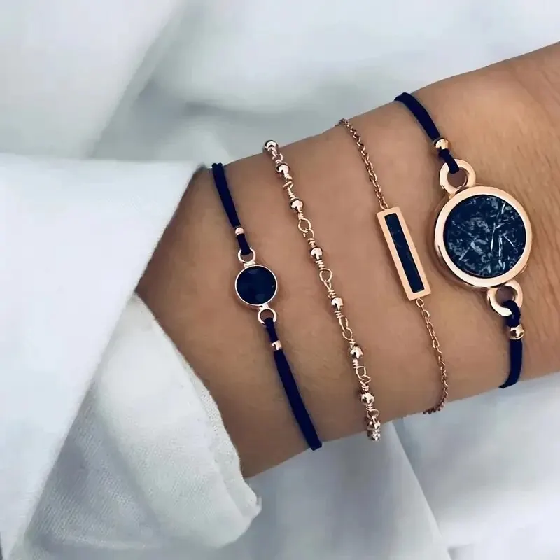Reloj de pulsera de cuarzo con esfera redonda de cielo estrellado simple para mujer