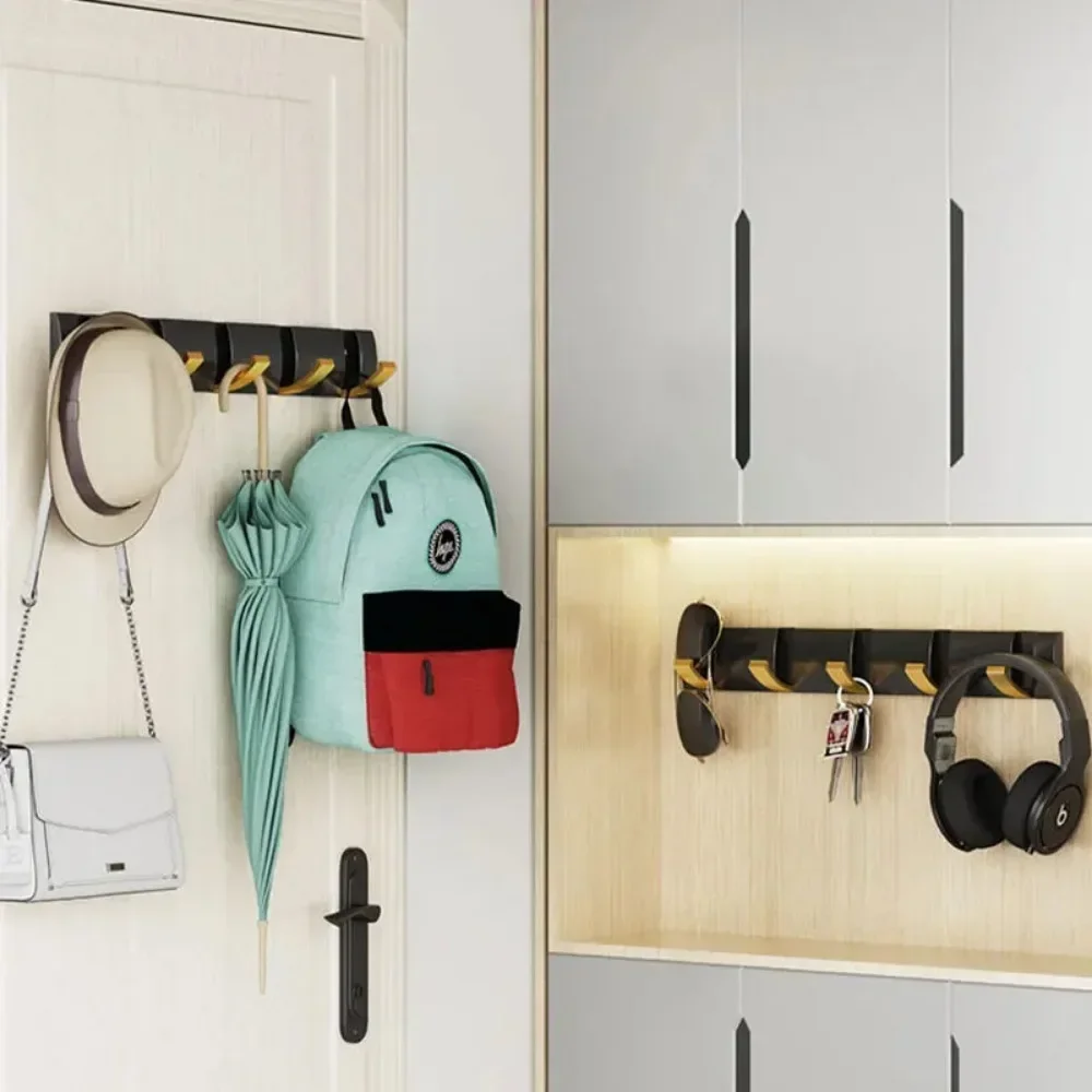 สีดํา Golden Robe Hook RacksTowel แขวนพับไม่มี Punch ติดตั้งติดผนัง Rack Hooks Coat ผู้ถือเสื้อผ้าห้องน้ํา
