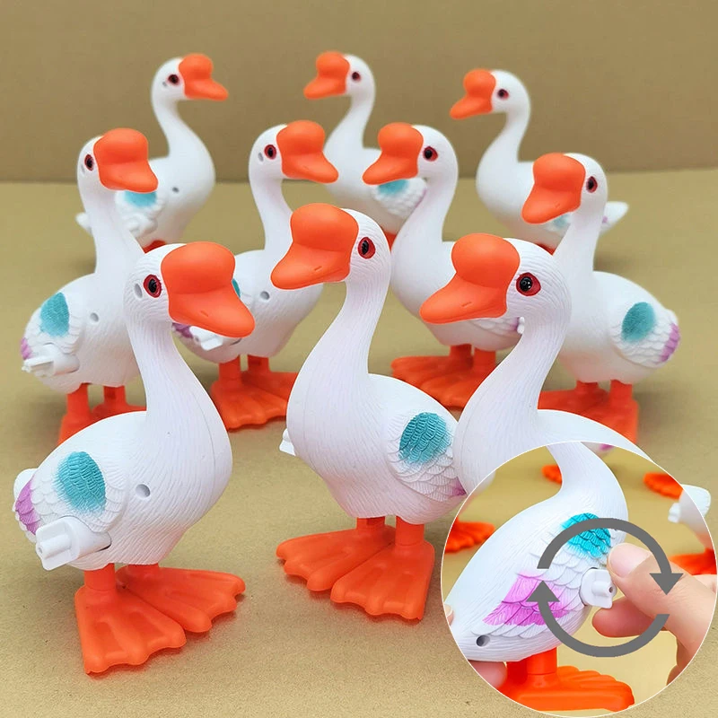 子供のための面白いウィンドメイクおもちゃ,かわいいジャンプジャンプ,白いガチョウの時計,シミュレーション,動物のジャンプ,男の子と女の子のための