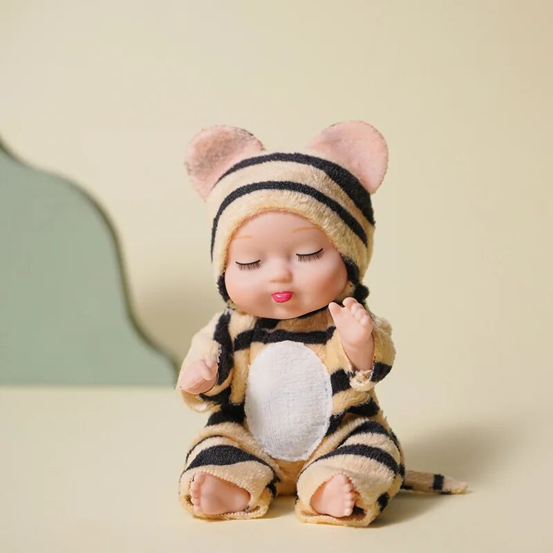 1 pièces 13 cm sommeil bébé poupée nouvelle mode Simulation renaissance poupées Mini poupée mignonne dessin animé Animal enfants jouet pour enfants cadeau d'anniversaire