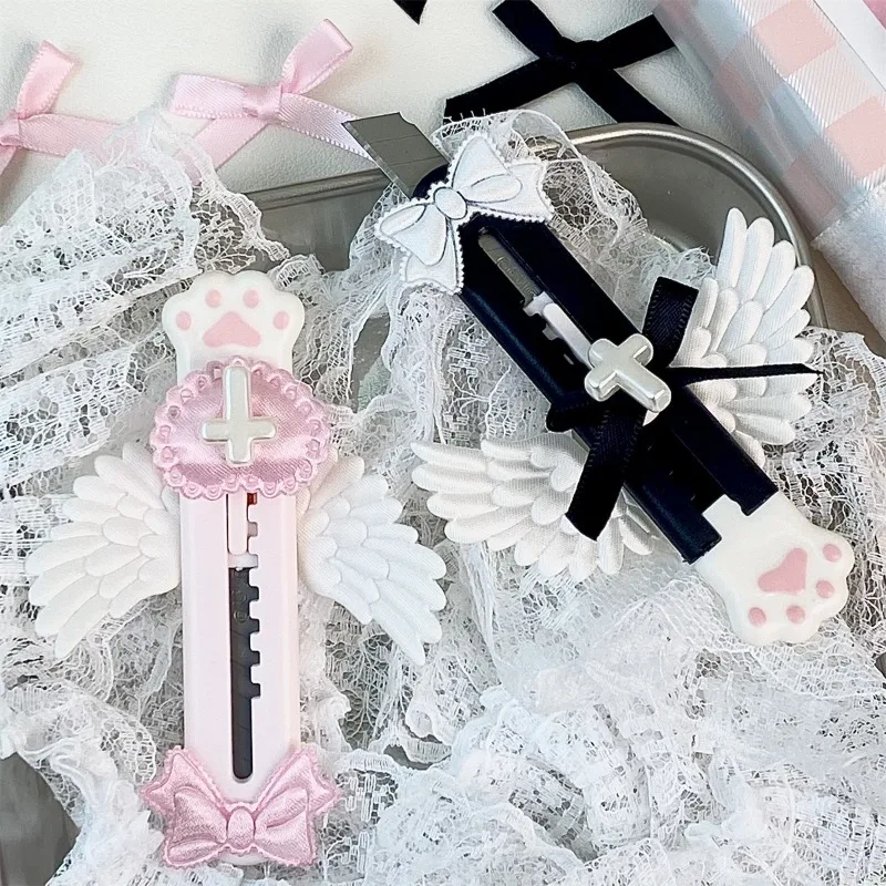 Niedliche Katze Pfote Utility Messer schöne Flügel Bowknot Stil offene Box Cutter Brief Umschlag Opener Mail Messer Schule Bürobedarf