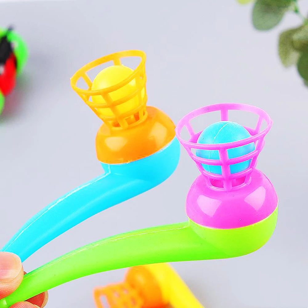 12Pcs 재미있는 마술 부는 파이프 플로팅 볼 게임 어린이 생일 파티는 기념품을 선호합니다 카니발 크리스마스 파티 상금 Piñatas 장난감