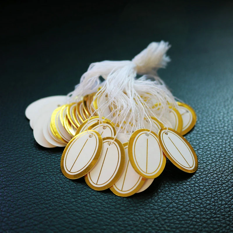 เครื่องประดับป้ายนามบัตร 100 ชิ้น/ล็อตราคา DIY Tie String เครื่องประดับป้าย Gold และ Silver แท็กขนาดเล็ก