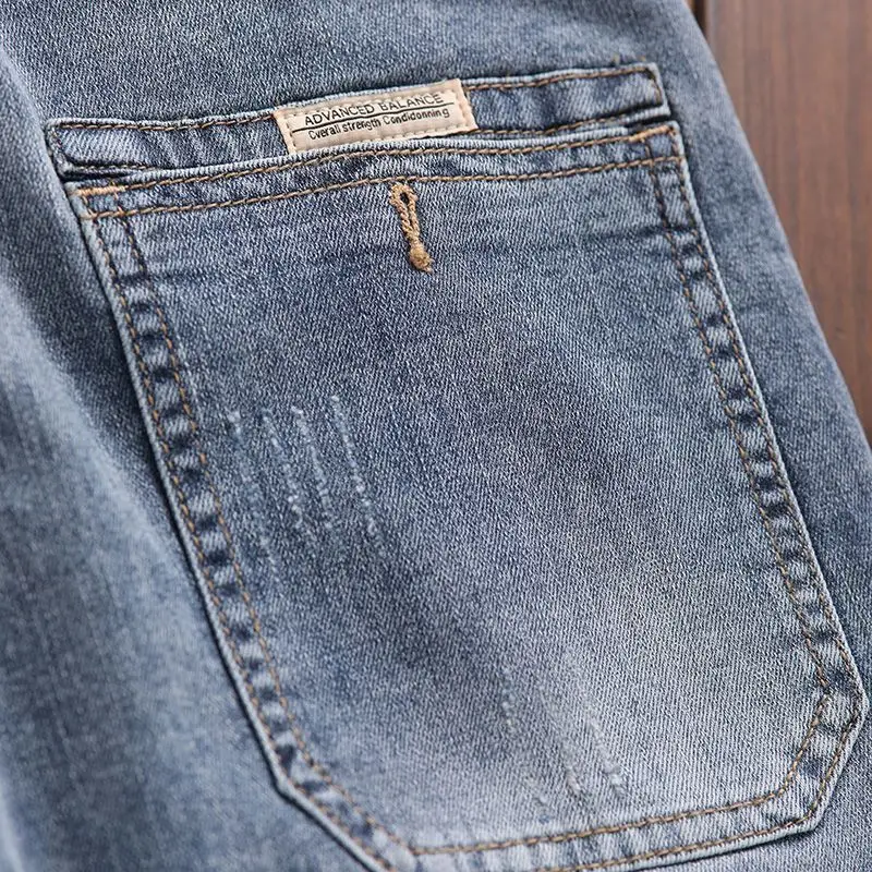 Ropa de lujo de estilo coreano, pantalones vaqueros de mezclilla para hombre con cordón de cintura elástica para otoño lavado, pantalones vaqueros elásticos informales para hombre