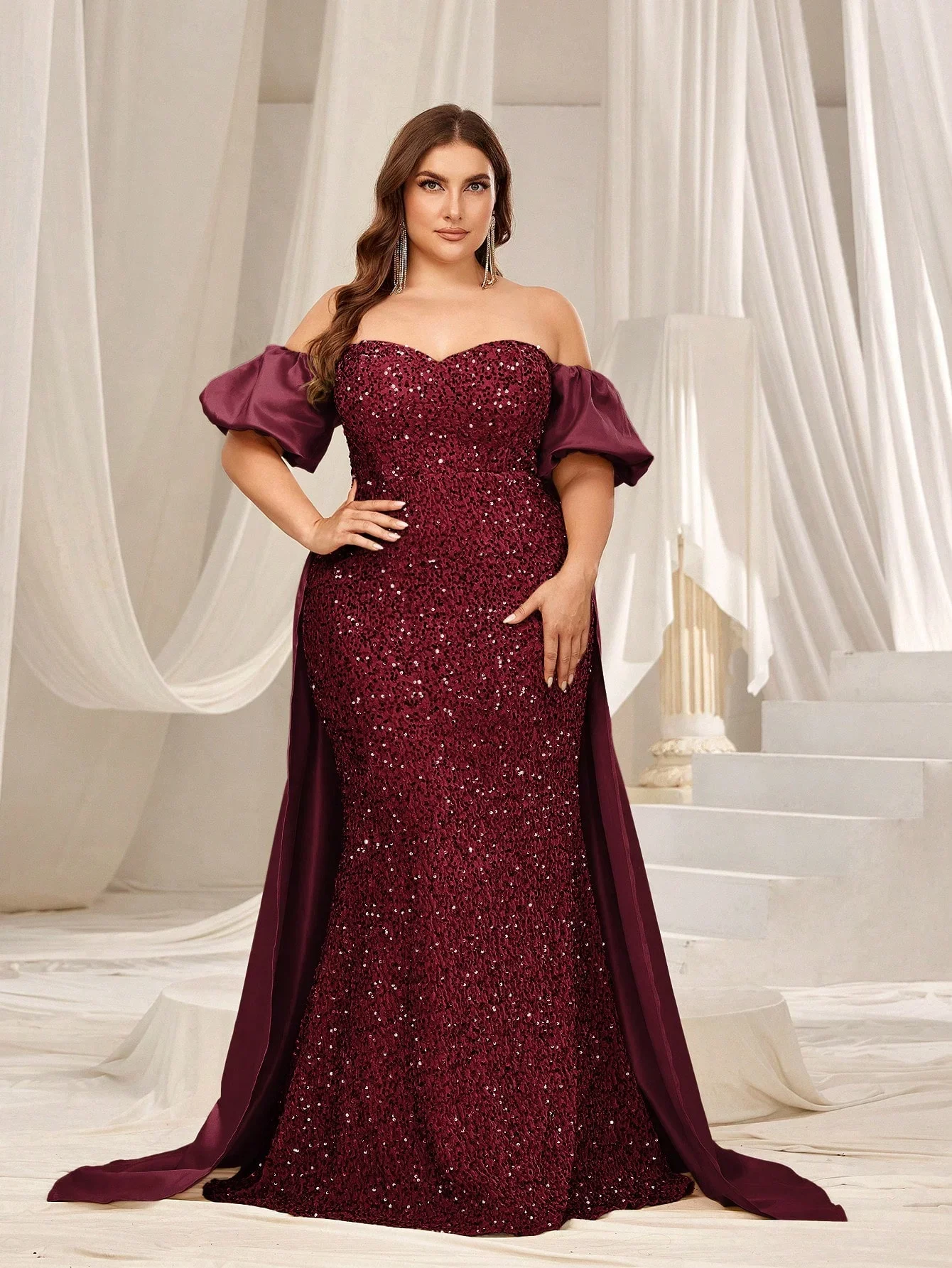 Vestido de lentejuelas de satén en contraste con mangas abullonadas y hombros descubiertos