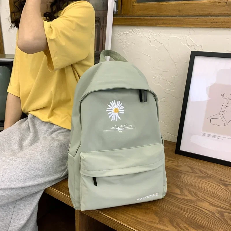 กระเป๋านักเรียนวัยรุ่นสำหรับ tas ransel anak perempuan กระเป๋าหนังสือพิมพ์ลายสำหรับผู้หญิงกระเป๋านักเรียนนักเรียนมัธยมกระเป๋าเป้ผ้าไนลอนลายดอกไม้น่ารักสีดำขนาดใหญ่