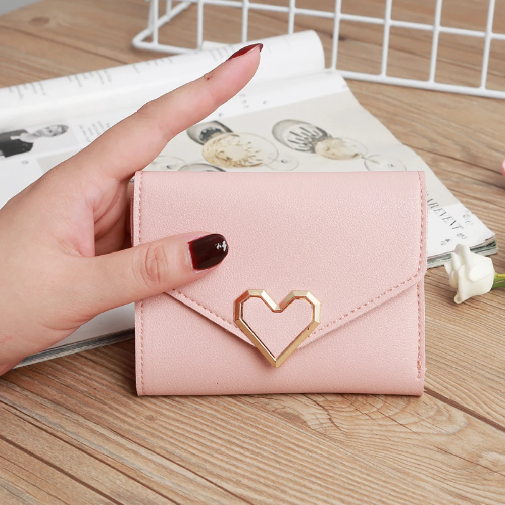 Nueva cartera pequeña de PVC a la moda para mujer, mini monedero fresco en forma de corazón versión japonesa y coreana corta