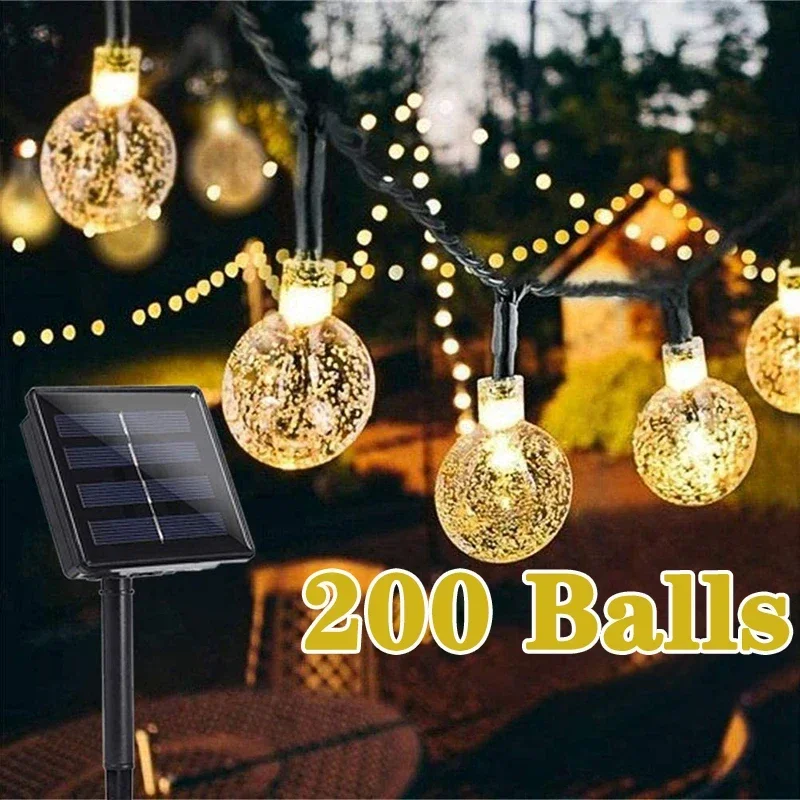 Guirnaldas de luces alimentadas por energía Solar de 200LED, guirnalda navideña de luces de hadas de cristal para exteriores, 8 modos, luz impermeable para Patio, decoración de fiesta en el jardín