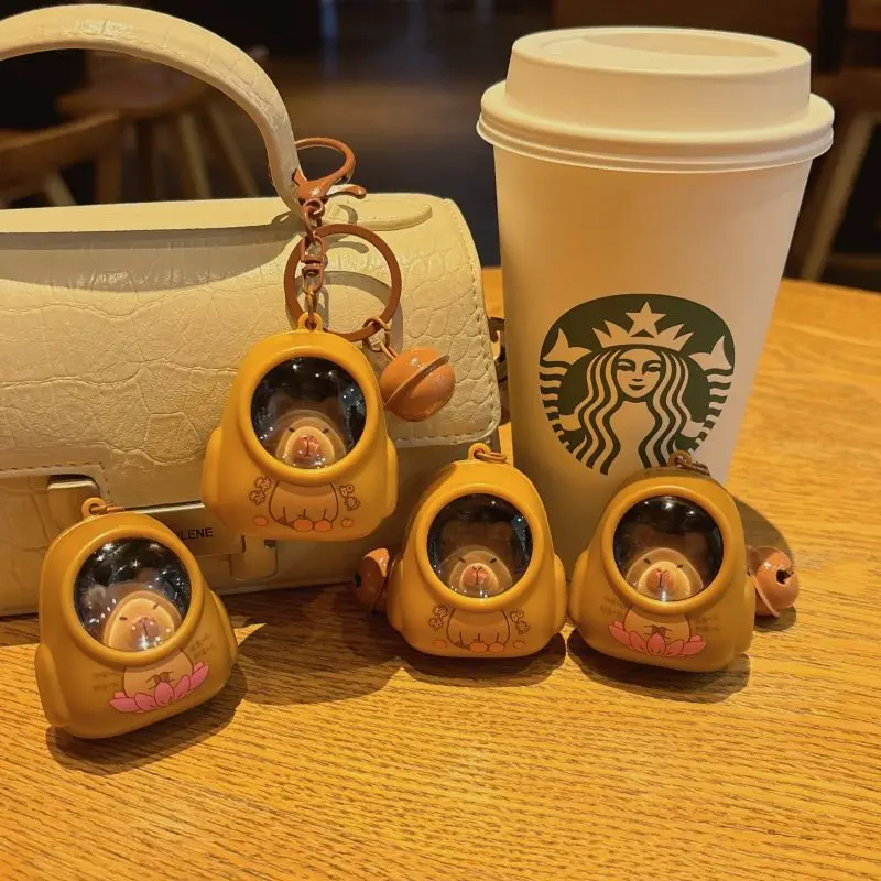 IFYOUOO Kreativer Kapibala leuchtender Schlüsselanhänger, niedliche Cartoon-Weltraumkapsel, Capybara-Schlüsselanhänger, Schultaschen-Anhänger, hängendes Geschenk für Freunde
