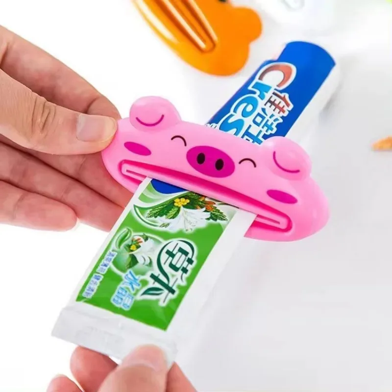 ห้องน้ําบ้านหลอดผู้ถือกลิ้ง Squeezer เครื่องจ่ายยาสีฟันอเนกประสงค์ยาสีฟันหลอด Squeezers