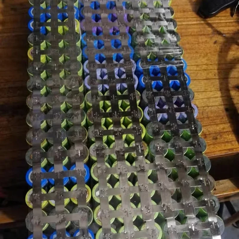 ニッケルメッキストリップ 18650 リチウムイオンバッテリーニッケルシートプレートコネクタ 0.1 ミリメートル 0.2 ミリメートルスチールベルトスポット溶接機バッテリー溶接機