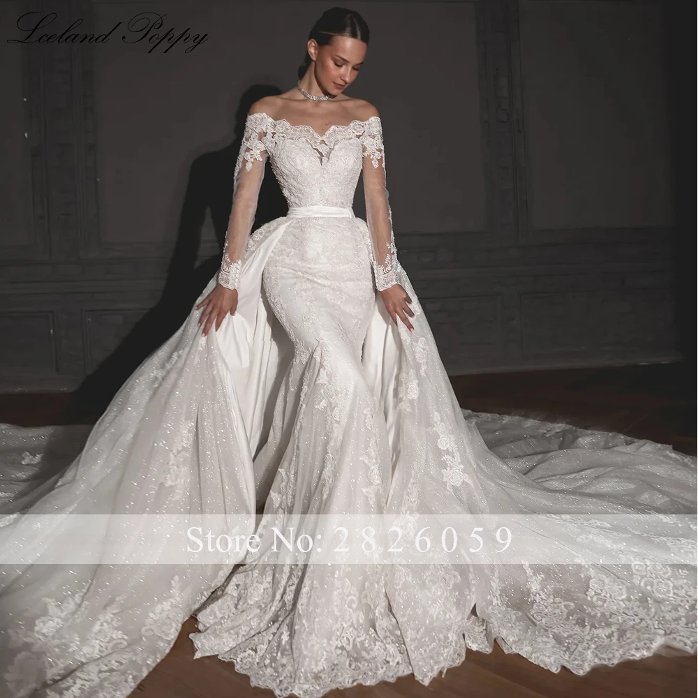 Lceland Poppy Abiti da sposa personalizzati in pizzo a sirena con scollo a barca Applicazioni di perline Abiti da sposa a maniche lunghe con strascico staccabile