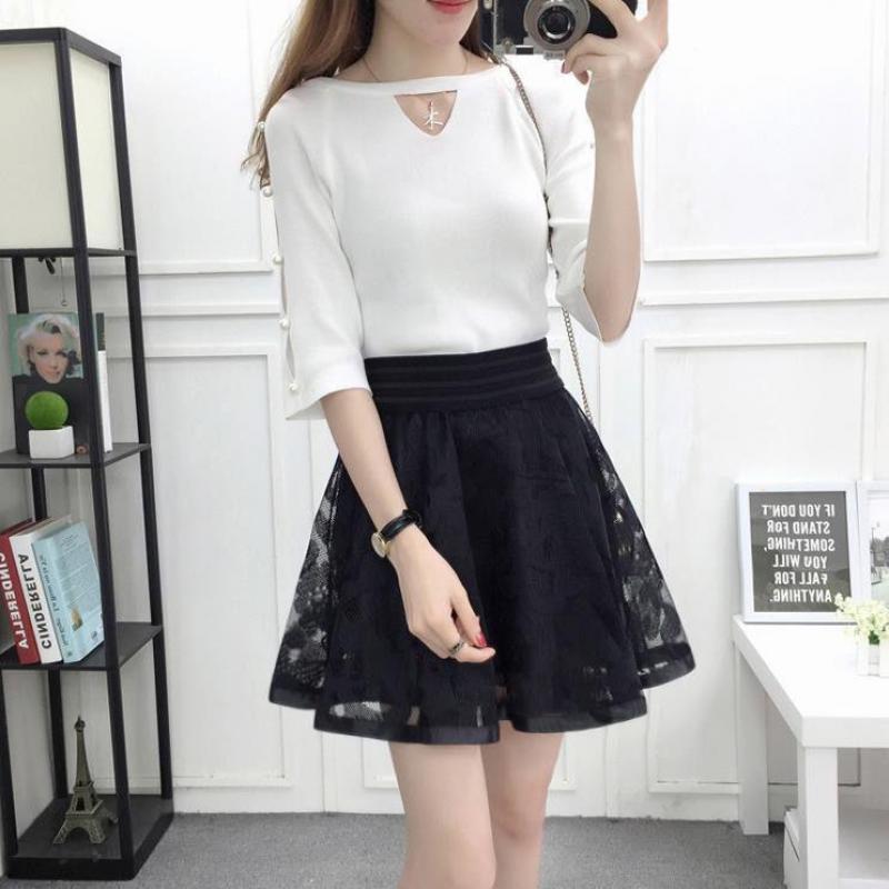 Estate nuova gonna elastica A vita alta donna tutto-fiammifero una linea Shaggy gonna corta maglia nera pizzo pieghettato colore puro giovane moda