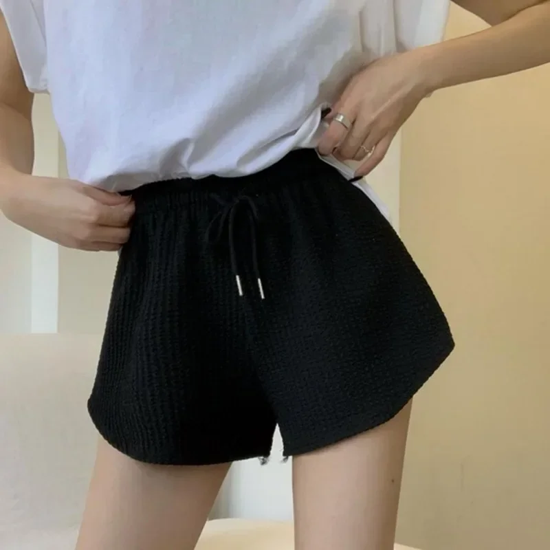 กางเกงขาสั้นผู้หญิงฤดูร้อนยืดหยุ่นสูง Lace Up Drawstring ขากว้างเหงื่อสั้นกางเกงขาสั้นวิ่งออกกําลังกายหลวมสบายๆกางเกงกีฬาขนาดใหญ่