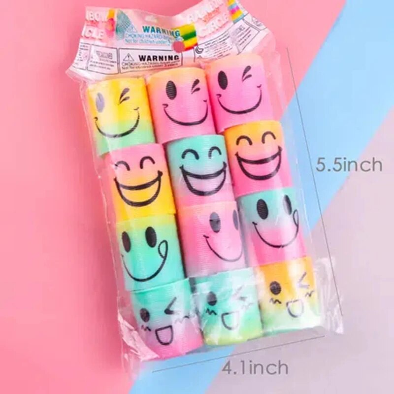 12 pz/set Arcobaleno Impilabile Musica Nostalgico Puzzle di Plastica Piccolo Regalo Primavera CircleMagic Arcobaleno Cerchio Per Le Ragazze Dei Ragazzi Regalo