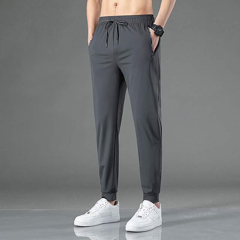 Pantalones de pierna ancha de pierna recta grande informales de seda de hielo de verano para jóvenes pantalones casuales sueltos deportivos de secado rápido con sensación de caída