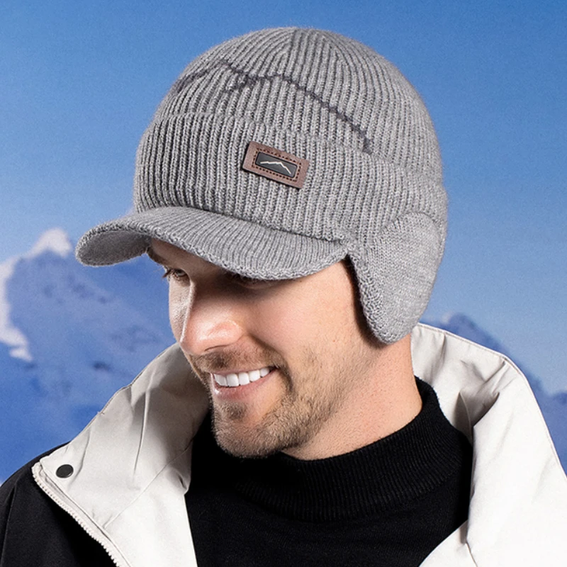 Men's Skullies Beanies with Visor for Warmth Winter Knit Earmuffs Thick Wool Lined Skull Ski Baseball Cap Winter Outdoor Riding