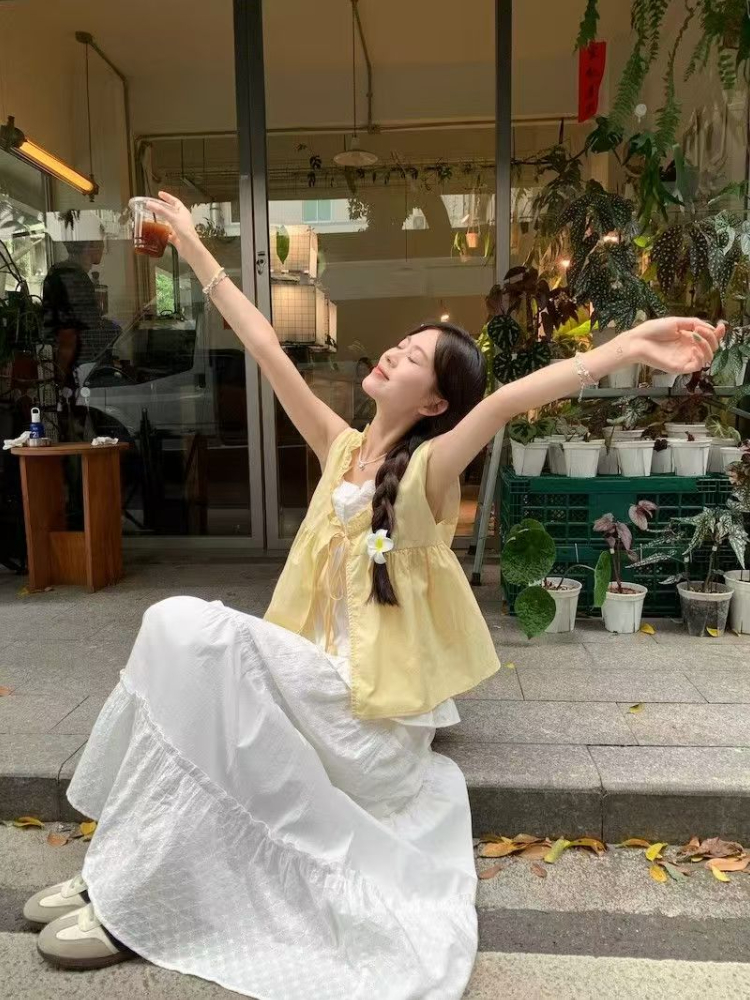 夏の韓国のファッションルーズノースリーブトップス女性甘いカジュアルレースアップ固体 V ネックシフォントップ女性のシックな薄いフリルブラウス