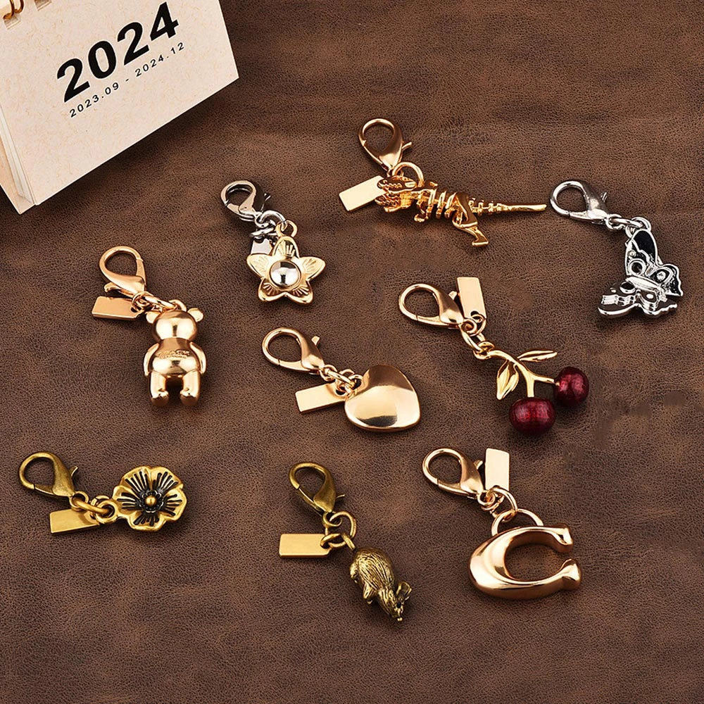 Exquisitos llaveros de mariposa y cereza de oso de alta gama para mujer, colgante de bolso Y2k, llaveros de coche, joyería, accesorios de decoración de regalo