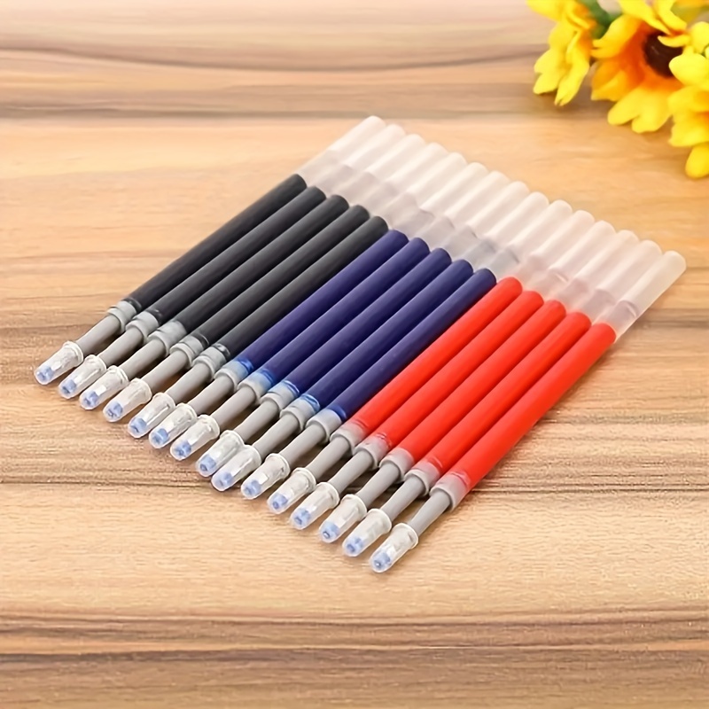 Caneta esferográfica de ação imprensa: adequada para escrita de estudantes e assinaturas comerciais, com opções de tinta preta, vermelha e azul.