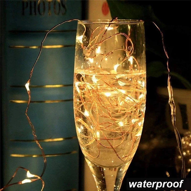 สายไฟ LED ทองแดงลวด 3XAA แบตเตอรี่ดําเนินการคริสต์มาสงานแต่งงานตกแต่ง 2M 5M 10M 100LED String ไฟ Fairy