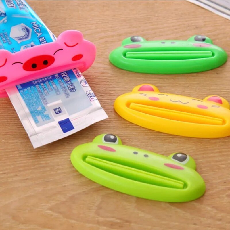 Exprimidor de pasta de dientes Manual de dibujos animados, limpiador con forma de Animal de rana bonita, prensa Manual, juego esencial perezoso, nuevo tipo