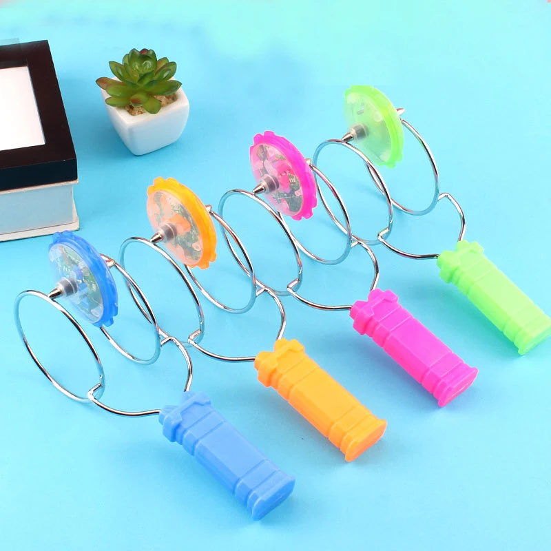 LED Magic Magnetic Orbit SPINNING TOP ของเล่น Creative Hand Cranked สี Luminous SPINNING ของเล่นเด็กของขวัญวันเกิด