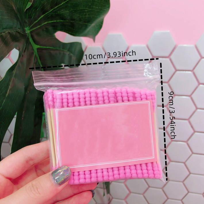 Hisopo de algodón desechable de doble cabeza para mujer, palo de algodón en espiral de colores para recoger las orejas, producto de higiene para el hogar, 100 piezas