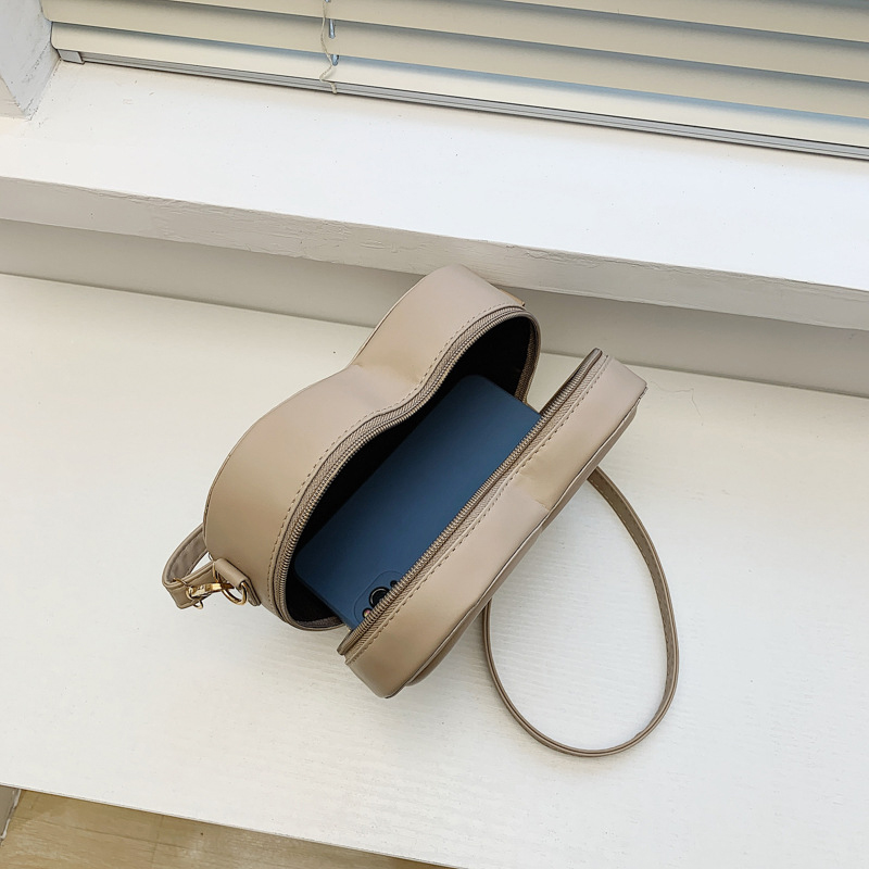 ファッションハート型キャンディーカラー小肩スリングバッグ女の子用puレザージッパー女性用カジュアルクロスボディバッグ